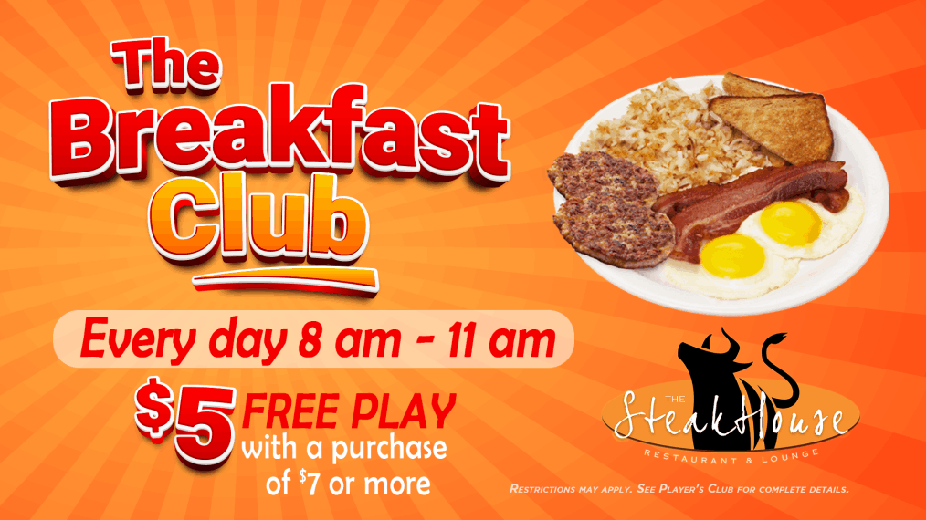 High Winds Casino 'The Breakfast Club' promotion at The Steakhouse. Available every day from 8 AM to 11 AM, offering $5 free play with a purchase of $7 or more. The image features a bright orange background, bold red and white text, and a breakfast plate with eggs, bacon, sausage, hash browns, and toast.